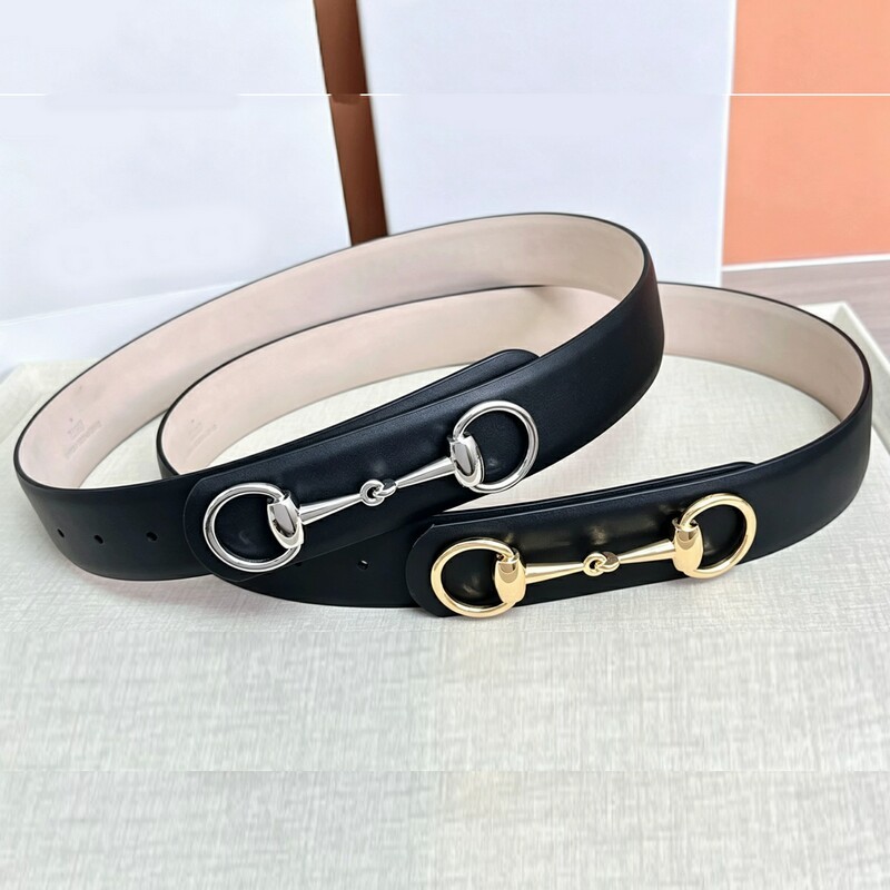 Couple wearing high-quality fashion leather belts with simple leather fasteners, round heads, and matching accessories for the waist.