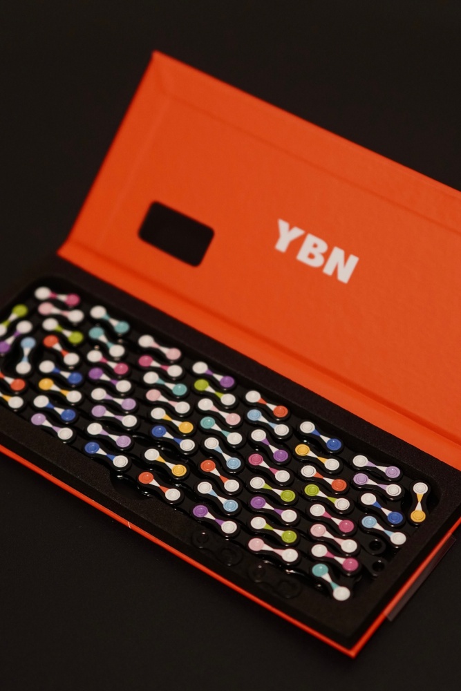 YBN Bicycle Chain 11/12 Speed X candy Pattern Bike Chain Compatible with Shimano SRAM MTB Road Gravel, Silver Black