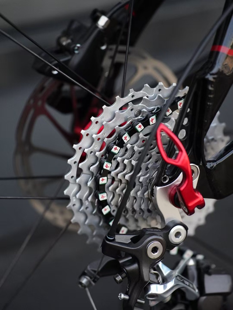 YBN Bicycle Chain 11/12 Speed Mahjong Pattern Bike Chain Compatible with Shimano SRAM MTB Road Gravel, Silver Black