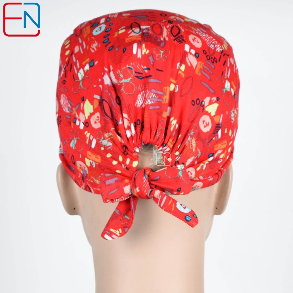 women surgical caps in red with butterflies