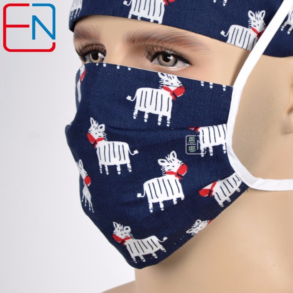 Surgical caps with sweatband in dark blue with zebra pattern