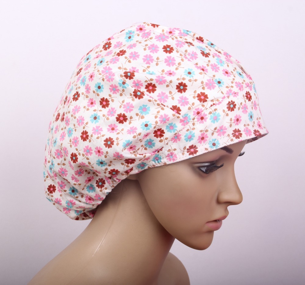 medical bouffant caps in cotton in pink with small daisy