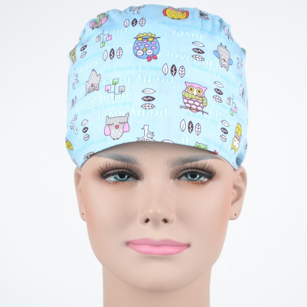 surgical scrub caps ,  100% cotton with sweatband in light blue with night owls