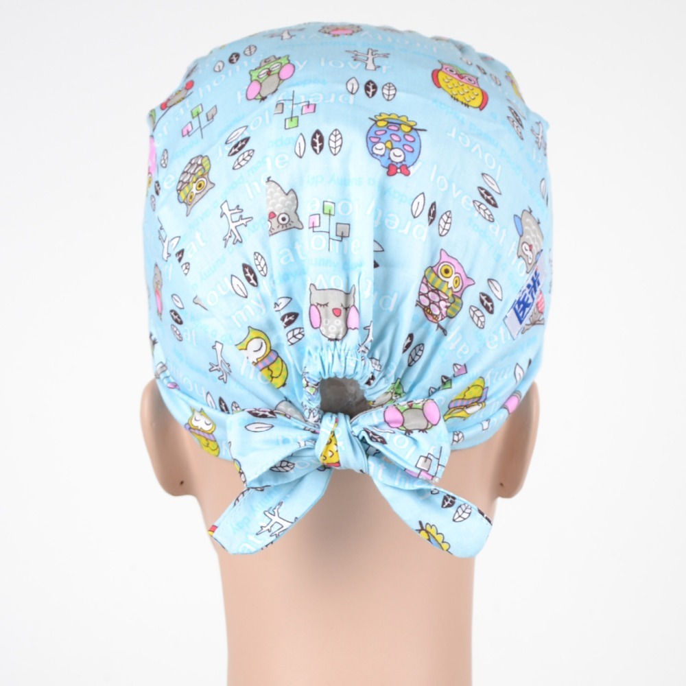 surgical scrub caps ,  100% cotton with sweatband in light blue with night owls