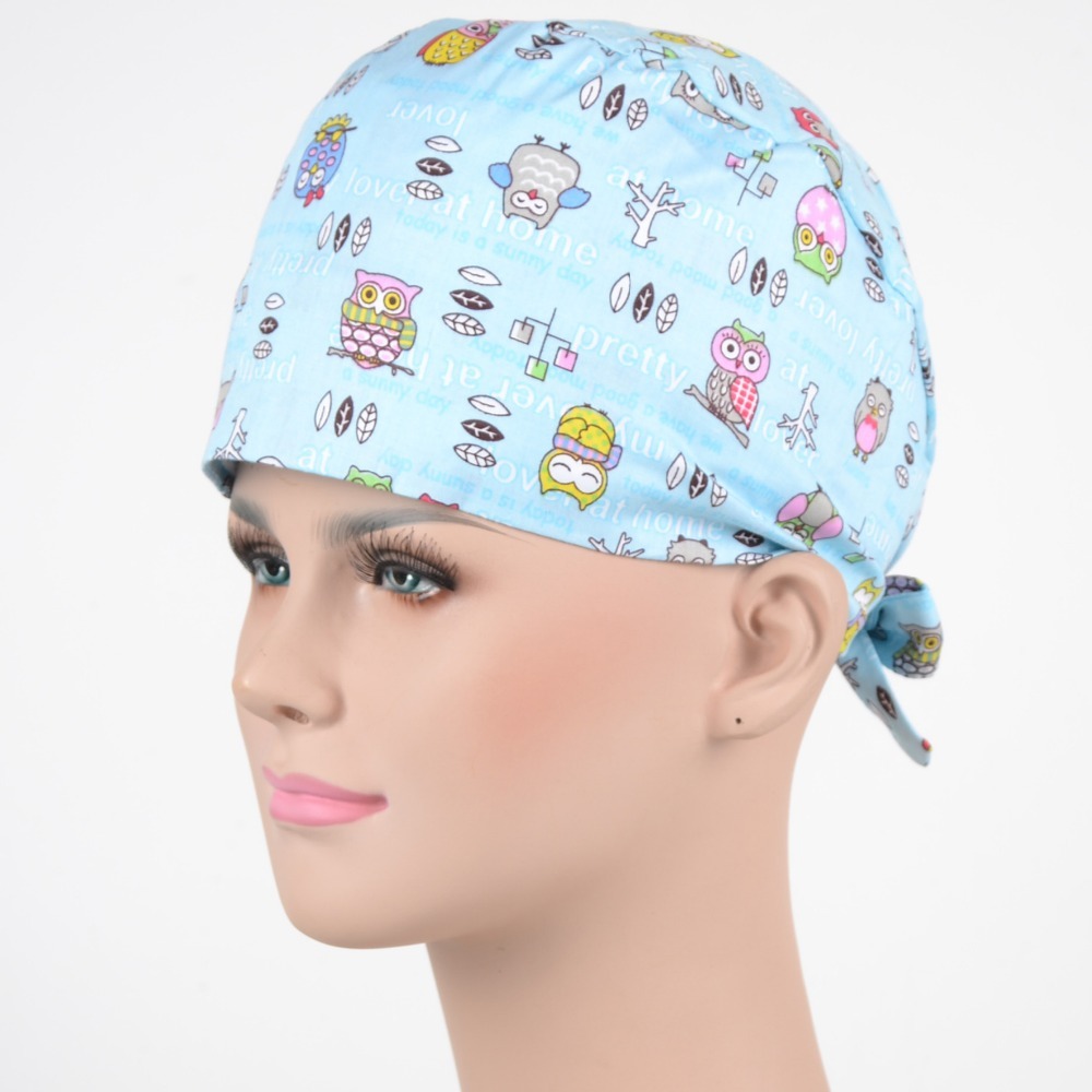 surgical scrub caps ,  100% cotton with sweatband in light blue with night owls