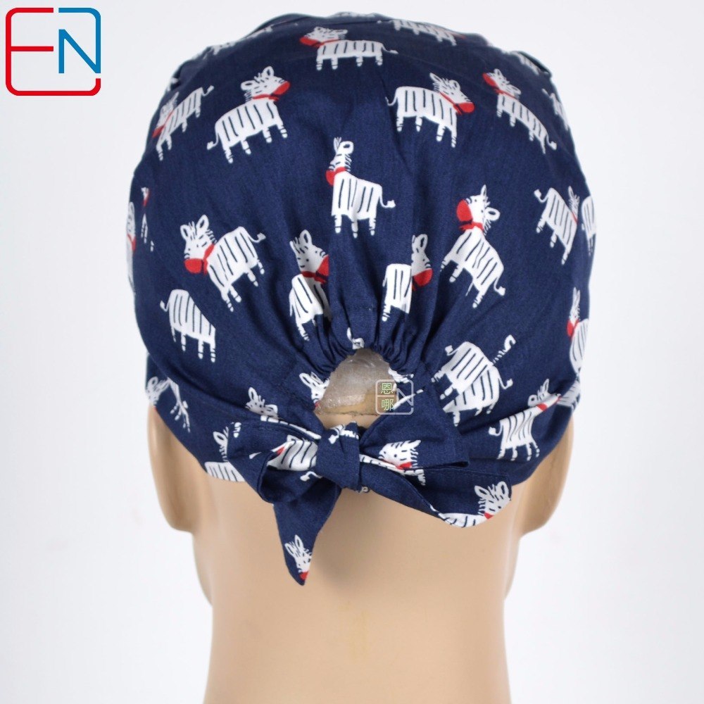Surgical caps with sweatband in dark blue with zebra pattern