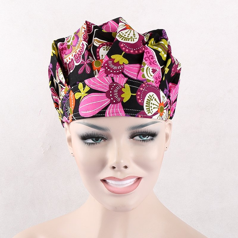 surgical scrub caps in black with pink flowers