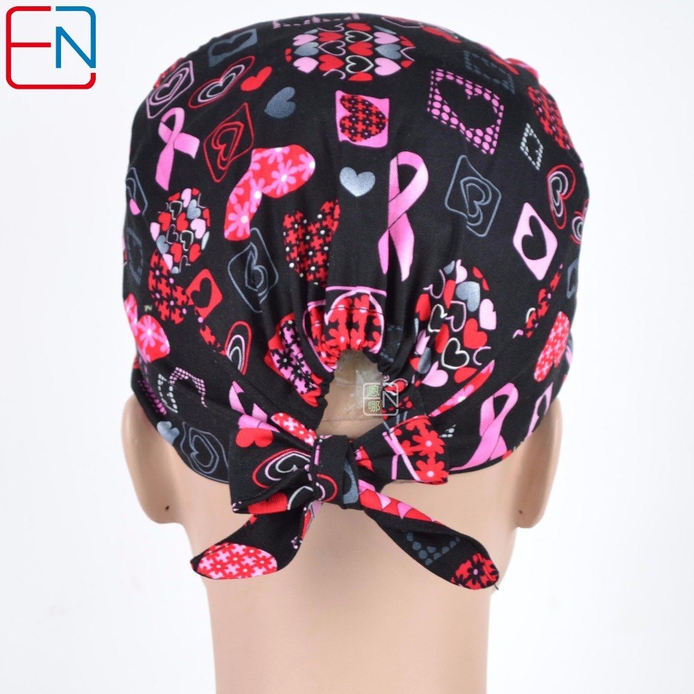 women surgical caps in black with pink ribbons