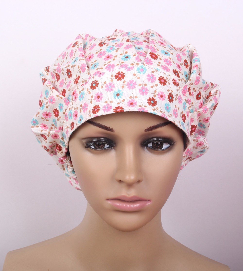 medical bouffant caps in cotton in pink with small daisy surgical bouffant