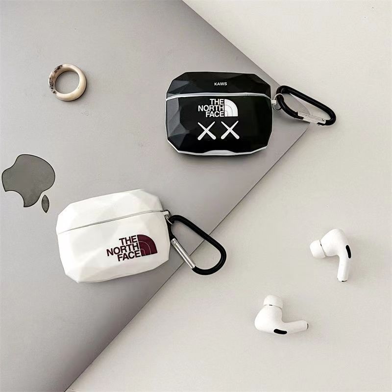 J1606カウズ ザノースフェイス ブランド イヤホンケースairpos proケースファッションkaws 落下保護シンプルairpods  1/2ケースカバー airpods 3イヤホンケース防塵 防水 Airpodspro用pro ケース 上品 airpodsproケース エアポッド  全面保護