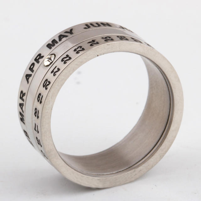 Rotatable titanium steel ring