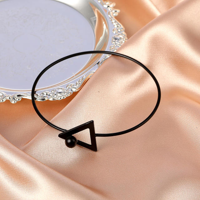 Hollow triangle open bangle