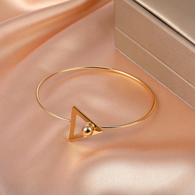 Hollow triangle open bangle