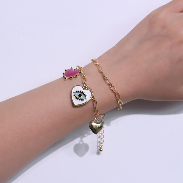 Enamel heart charm evil eye chain bracelet