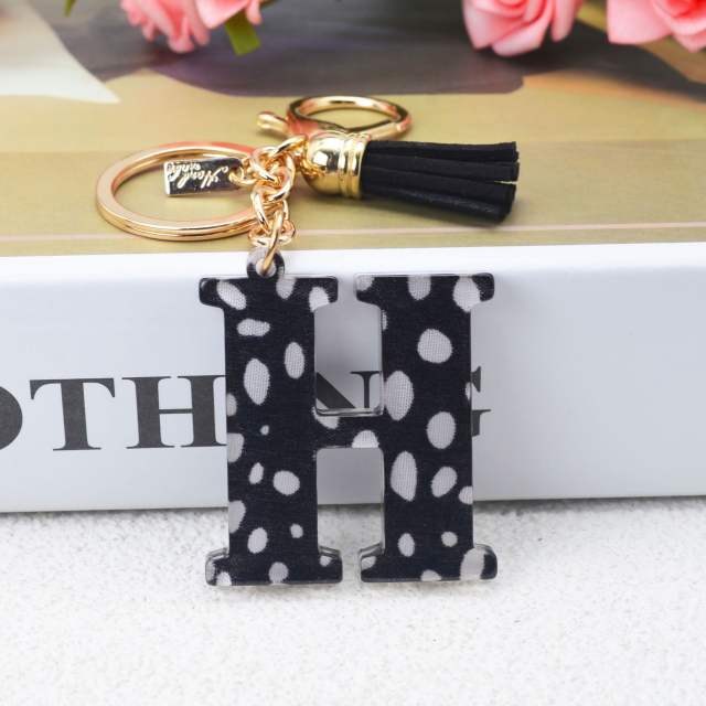 Black tassel white dots keychain