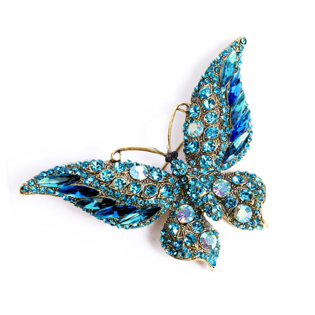 Color diamond butterfly brooch