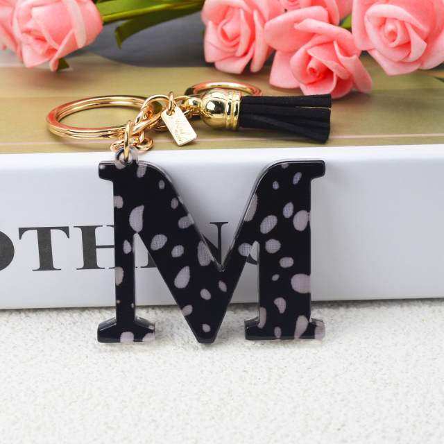 Black tassel white dots keychain