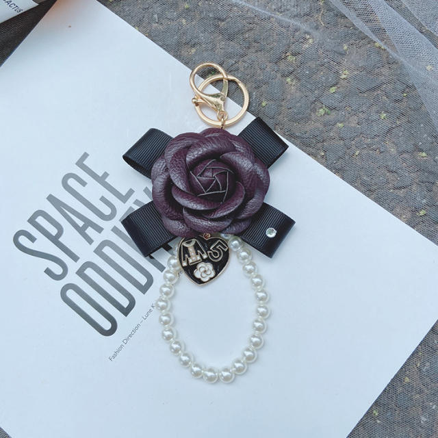 Bow-knot flower pearl keychain