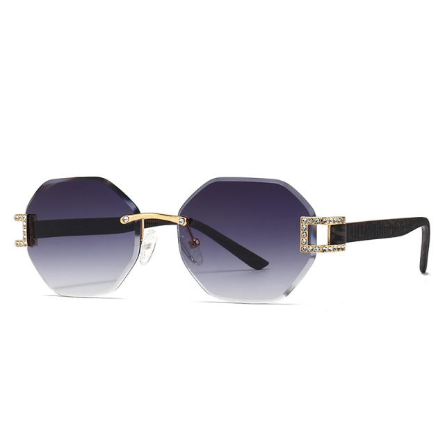 Irregular shaped rimless sunglasses