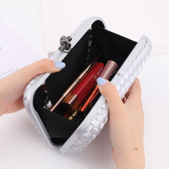 Women braid clutch