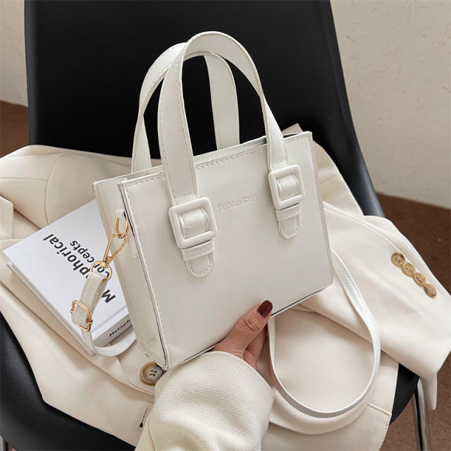 Solid color square shaped handbag