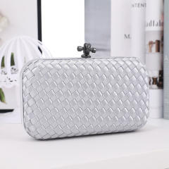 Women braid clutch