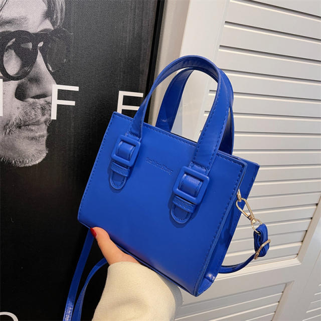 Solid color square shaped handbag