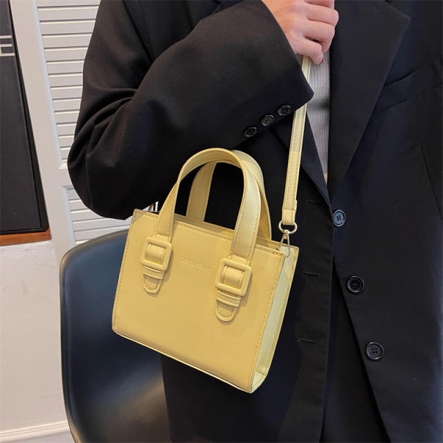 Solid color square shaped handbag