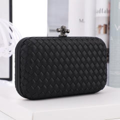 Women braid clutch