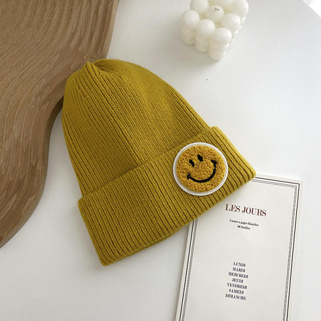 Smilely face knitted beanie cap