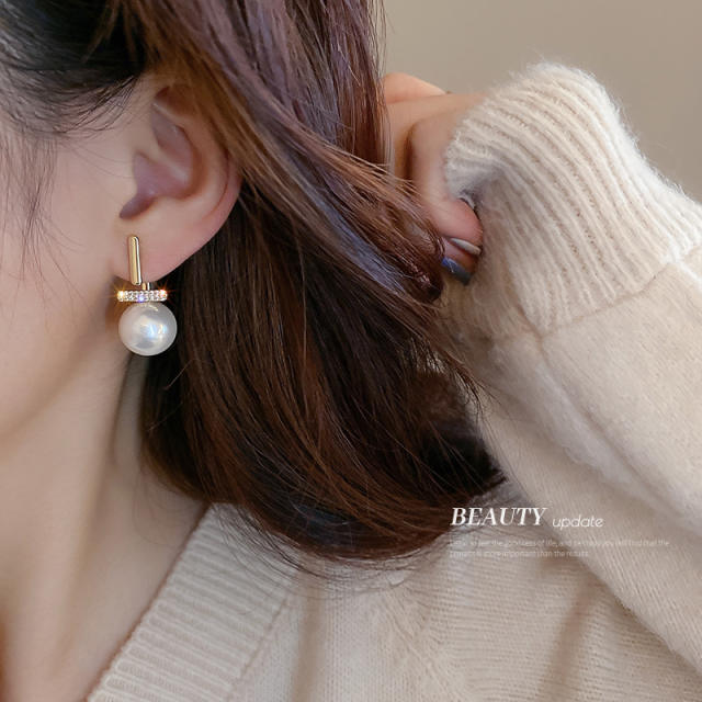 Diamond T pearl jacket earrings