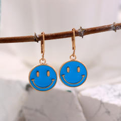 Enamel smile face huggie earrings