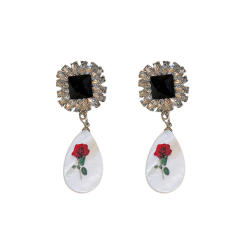 Vintage acrylic drop diamond earrings