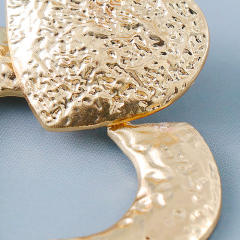 Exaggerated metal heart earrings