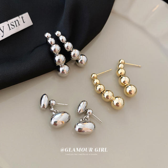 Silver needle metal ball unique earrings