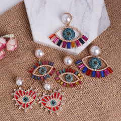 Diamond evil eye earrings