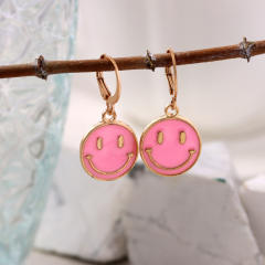 Enamel smile face huggie earrings