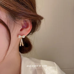 Opal stone bow diamond earrings