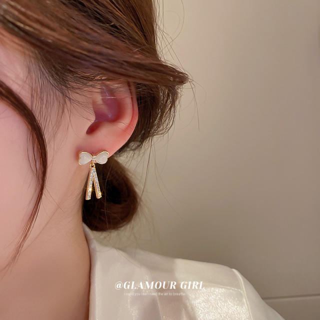 Opal stone bow diamond earrings