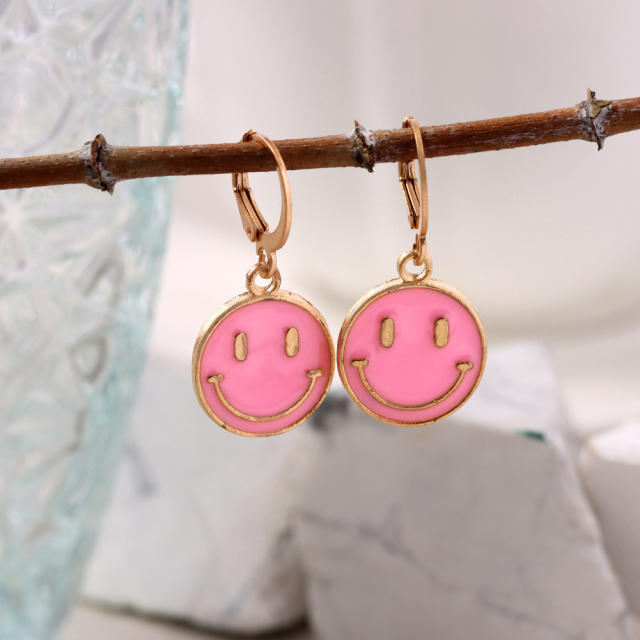 Enamel smile face huggie earrings