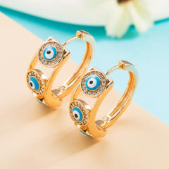 Enamel evil eye huggie earrings