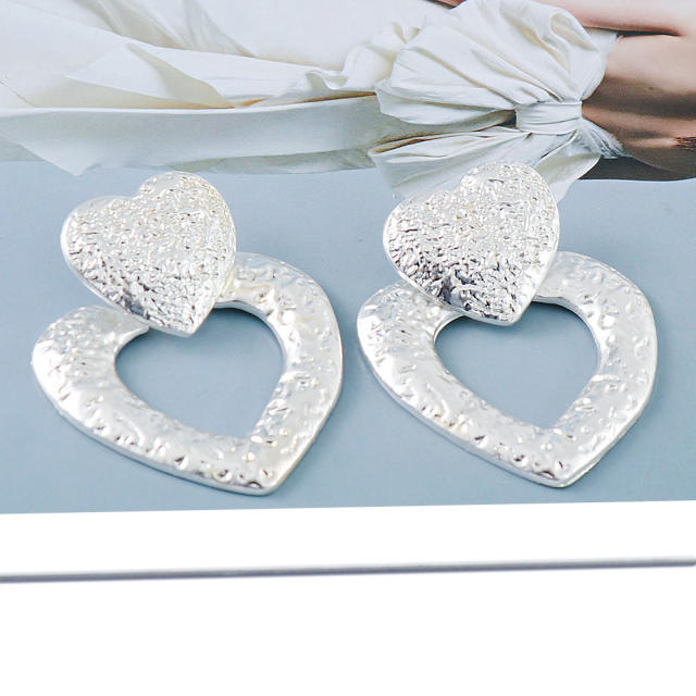 Exaggerated metal heart earrings