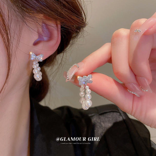 Cubic zircon bow pearl drop earrings