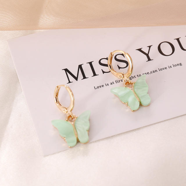Color butterfly huggie earrings