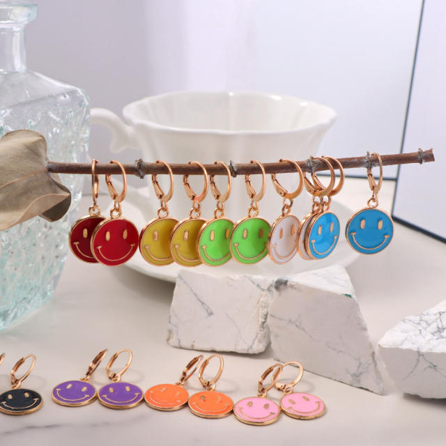 Enamel smile face huggie earrings
