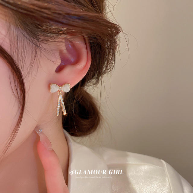 Opal stone bow diamond earrings
