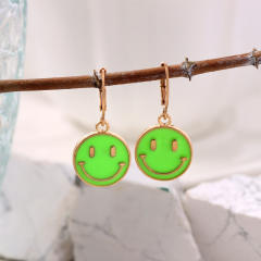 Enamel smile face huggie earrings