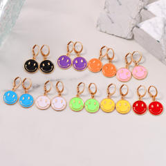 Enamel smile face huggie earrings