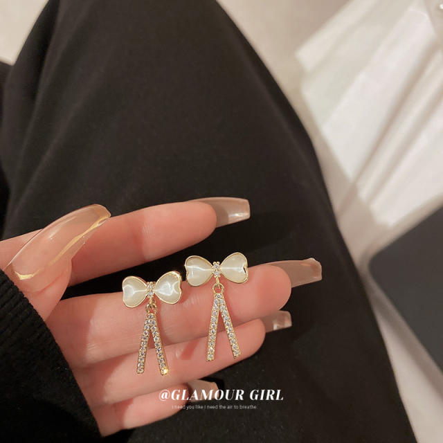 Opal stone bow diamond earrings