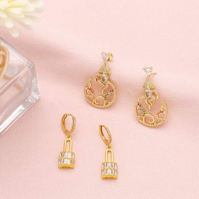 Diamond monkey padlock dangle earrings